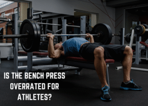 Athlete performing a flat barbell bench press